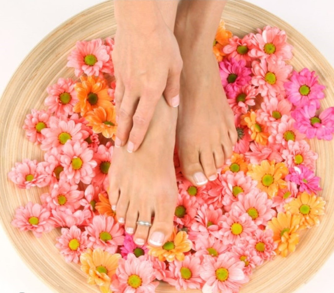 Photo of feet having pedicure